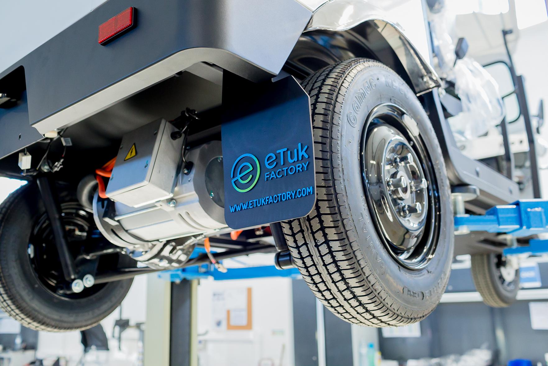 Custom branded eTuk supporting a mobile Business in a Box operation